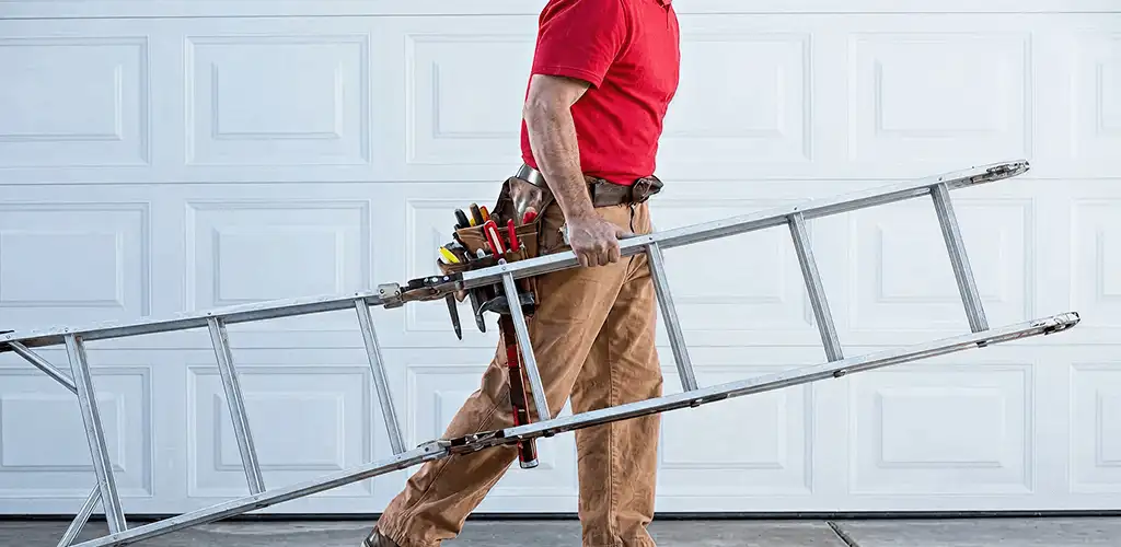 Garage door repair technician arriving with tools and ladder in Aurora, CO